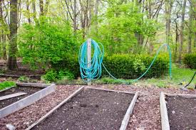 The rain barrel has a large storage capacity and comes with a complete diverter system that can be connected to a soaker hose for the convenient and automatic watering of nearby plants. Automatic Watering For Raised Beds Kevin Lee Jacobs