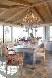 The comfortable sofa chair is white in color, as are some of the cushions and the wall. 26 Ways To Create A Shabby Chic Dining Room Or Area Shelterness