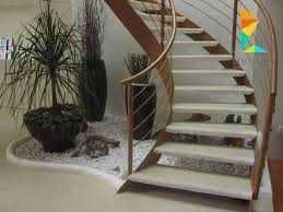 كتالوج صور سلالم داخلية بتصميم مودرن للمنزل العصري Small Garden Under Stairs Pebble Garden Indoor Gardens