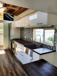 The sleek black cabinet body and stainless steel door with a recessed handle make this unit a stylish addition to any space. Pin On Tiny Houses