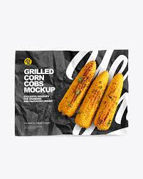 Download Wrapper With Grilled Corn Cobs Mockup In Packaging Mockups On Yellow Images Object Mockups
