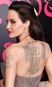 Angelina jolie's tattoos also angelina jolie is known as tattoo love, she's regularly featured in celebrity news magazines and websites with one of her new tattoo designs. Angelina Jolie S Tattoos What S Their Secret Meaning