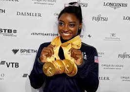 With a combined total of 30 olympic and world championship medals, biles is the most d. Simone Biles Net Worth How Rich Is The Us Gold Medalist Gymnast Otakukart