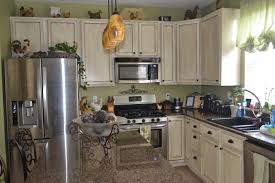 We are considering using the rustoleum cabinet transformations since it cuts out all the sanding and it is cost effective. Thrifty Artsy Girl White Glazed Cabinet Transformations A Review A Year Later