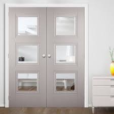 Amsterdam Grey Primed Internal Door Pair With Clear Safety Glass Lifestyle Image Greydoors Dobledoors Deuren Interieur Glas Amsterdam