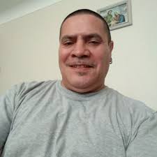 What Chicago gang has light blue and black as their colors?