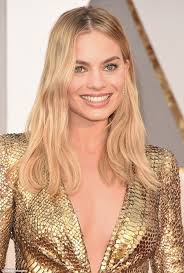 Oscars 2016 red carpet sees Margot Robbie stun in a gold snakeskin gown