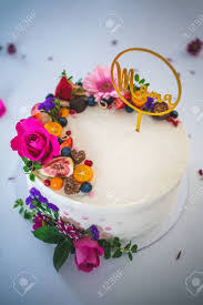 If you are in an english speaking country you may decide to go out for something to eat, or perhaps you might go shopping for food and experience the need to ask for a specific fruit or vegetable. Sweet White Cheesecake Torte With Fresh Fruits And Rose Flowers Stock Photo Picture And Royalty Free Image Image 142070369