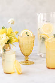 The Easiest And Most Refreshing Thyme Tequila Lemonade Recipe You Can Use Store Bought Light Lemo Tequila And Lemonade Lemonade Recipes Holiday Drinks Alcohol