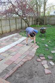 Digging Around The Yard Unearthed A Random Paver Or Two Or Hundred All Mix Matched And Be Reclaimed Brick Patio Brick Patios Playground Backyard Landscaping