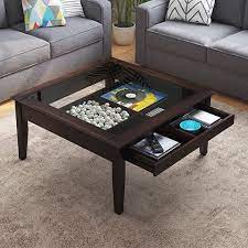 Coffee table sets are on sale every day at cymax! Tete A Tate The Tate Coffee Table Provides The Perfect Setting For Coffee And Conversations Deligh Display Coffee Table Coffee Table Living Room Coffee Table