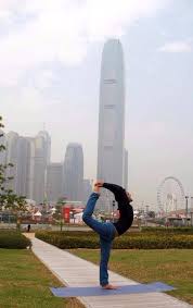 And In The Backdrop Of The Gleaming Spires Of Hong Kong Limbering Up For Yogaday International Day Spires World
