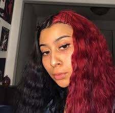 Half and half hair (or split dye) is when you divide the hair right down the middle and dye each half a different color. Half Black With Red Hair