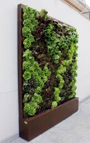 This garden used carefully spaced brick outcroppings to maximize space and deliver a visually pleasing pattern. 120 Cozy Vertical Garden Decor Ideas Vertical Garden Design Vertical Garden Diy Vegetable Garden