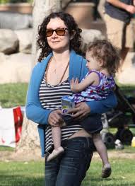 That is one scary looking mama. Picture Of Sara Gilbert