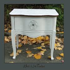 White and gold round nightstands with curvy. Portfolio Of Tables And Cabinets What S Next Furniture