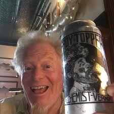 Should I prune tall pear tree to match shorter one?