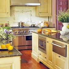 An inviting, traditional adobe kitchen with santa fe style. Yellow Kitchen With A Little Purple On The Side Yellow Kitchen Cabinets Kitchen Cabinets Classic Kitchen Cabinets