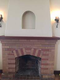 What to do with the space above the mantel? Ideas For Arched Fireplace Niche Fireplace Fireplace Niche Decor Niche Decor