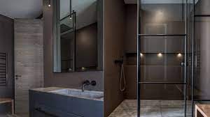 The tile shape helps to make the room look wider, which is a great choice for such a narrow space. Luxury And Industrial Sleek Bathroom Designs Rwd