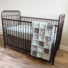 Reversible quilt, fitted crib sheet, and tailored dust ruffle; Vintage Truck Mint Green And Grey Crib Bedding