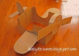 How To Make A Big Cardboard Airplane Here S My Version Of The Cardboard Box Airplane Cardboard Airplane Cardboard Costume Cardboard Box