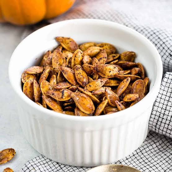 Roasted pumpkin seeds ready to eat, AI generated