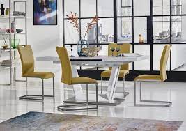 The product measures 75.8w x 36d x 30.5h. Bianco Large Extending Dining Table Furniture Village