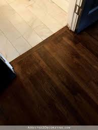 Refinished Red Oak Hardwood Floors Transition Between Hallway And Tiled Bath Red Oak Hardwood Floors Wood Floor Design Flooring