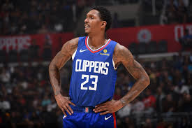 Hawks guard lou williams calls a defense against the miami heat during the first half of the exhibition opener at philips arena in atlanta on sunday , oct. Fans Trolls Lou Williams After Being Traded To Atlanta Hawks For Rajon Rondo Terez Owens 1 Sports Gossip Blog In The World