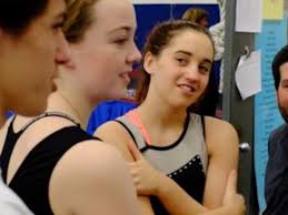 At Interstate Gymnastics, high school rivals all