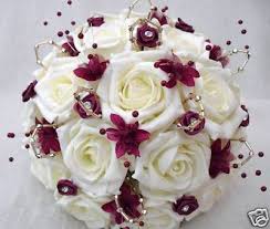 Gold wedding rings on white heart shaped pillow. Cranberry Champagne And Gold Wedding Bouquet Wedding Flowers Posy Bouquet In Ivory Roses With Burgundy And Gold Prom Flowers Bridal Bouquet Gold Bouquet