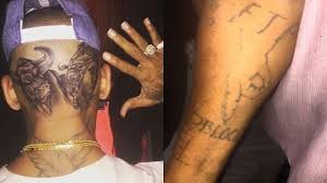 Almost every gang that exists has some specific tattoos associated with them. Chris Brown Gets Another Head Tattoo And A Blood Tattoo Youtube