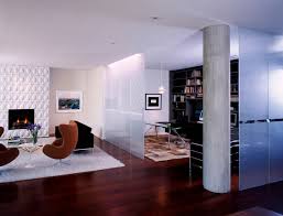 Here, a bank of multipane windows between the living room and the front hallway makes both areas feel lighter and airier. 15 Beautiful Foyer Living Room Divider Ideas Home Design Lover