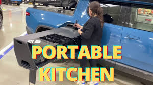 This chevy was absolutely covered in thick frozen mud and the interi. Close Look At Rivian S Insanely Engineered 5 000 Camp Kitchen That Fits In Its Electric Pickup Truck Electrek