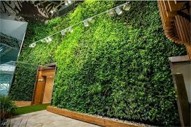 14 Beautiful Vertical Gardens Resources To Grow Your Own Uniguide Vertical Garden Indoor Vertical Garden Vertical Garden Planters