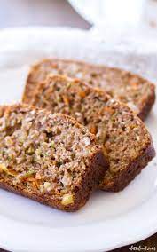 This Homemade Zucchini Bread Recipe Is Filled With Shredded Carrots Sweet Pineapple And Coconut Carrot Zucchini Bread Zucchini Bread Zucchini Bread Recipes