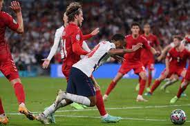 England's raheem sterling, left, is fouled by denmark's mathias jensen and a penalty is awarded during the euro 2020 soccer semifinal match between england and denmark at wembley stadium in london, wednesday, july 7, 2021. Vtktvjgw7kjfm