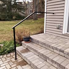 Attaching steel to concrete is rarely as simple as it ought to be. Low Profile Handrail Great Lakes Metal Fabrication