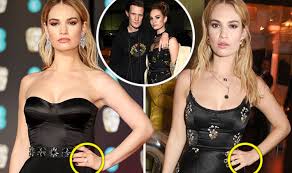 But, is she getting married. Baftas 2018 Lily James Quickly Ditches Ring After Sparking Matt Smith Engagement Rumours Celebrity News Showbiz Tv Express Co Uk