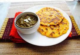 Mustard Green Sarso Ka Saag And Indian Corn Meal Flatbread Makki Ki Roti Is An Authentic Traditional Win Punjabi Food Indian Food Recipes Authentic Recipes