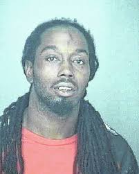 Murder suspect among 41 charged in roundup