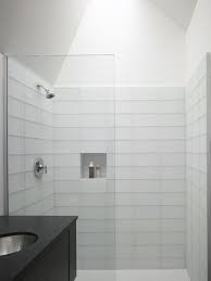 Tiled bathroom ideas can be simple but effective. 37 White Rectangular Bathroom Tiles Ideas And Pictures White Bathroom Tiles White Tile Shower Modern Bathroom