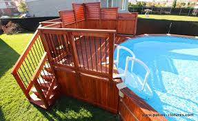 Cedar Above Ground Pool Deck With Privacy Screens And Staircase Partially Integrated Into The D Backyard Pool Landscaping Above Ground Pool Decks Backyard Pool