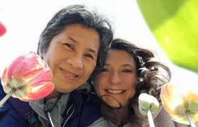 We dodged the raindrops and saw the tulips yesterday. Earlier in the day,  it was looking pretty iffy. Heavy dark clouds and a steady stream of rain.  But texting with Candace, she