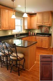 It is possible to touch it up a little by adding new granite and by adding hardware. Medium Oak Kitchen Cabinets 2021 Green Kitchen Walls Kitchen Wall Colors Kitchen Design