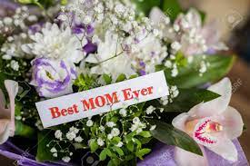Though lilies are normally considered an easter flower, they are often used on mother's day as well. Happy Mothers Day Gift And Best Mom Ever Greeting Card On Table Beautiful Stock Photo Picture And Royalty Free Image Image 107242267