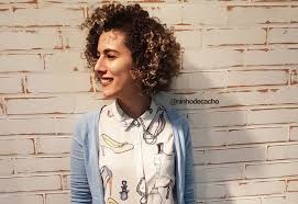 Just slick your hair up into a bun and bring a few of the shorter pieces toward the front for some wispy (faux) bangs. 29 Short Curly Hairstyles To Enhance Your Face Shape