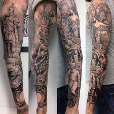 A black and white colour palette makes the design pop. Top 73 Religious Sleeve Tattoo Ideas 2021 Inspiration Guide