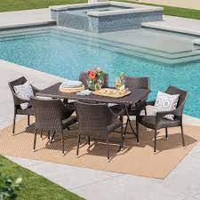 Noble House Madeleine Multi Brown 7 Piece Wicker Outdoor Dining Set With Foldable Table And Stacking Patio Furniture Sets Wicker Dining Set Outdoor Dining Set
